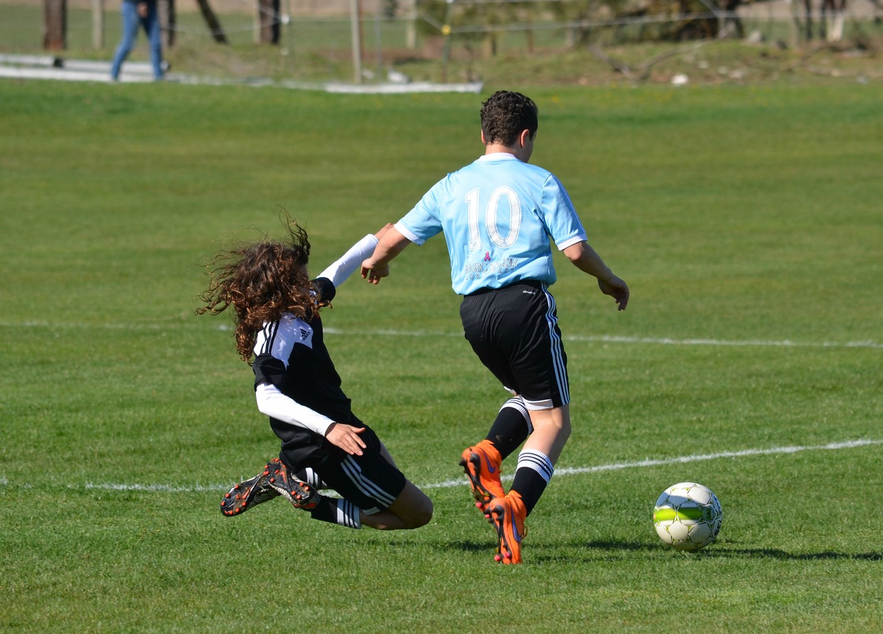 Soccer slide tackle defending defense youth soccer